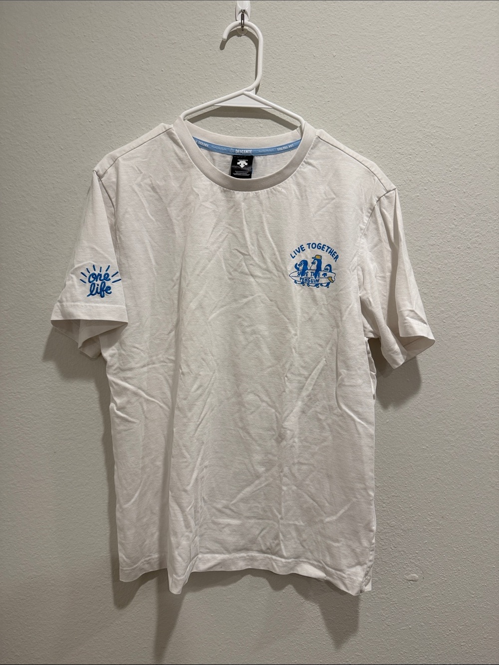 Descente White Short Sleeve Tee with Blue 'Live Together' Graphic